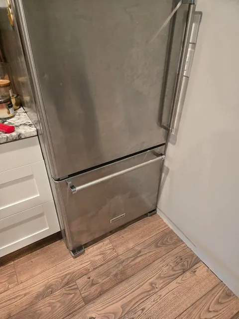 Help: fridges freezer too close for baseboard