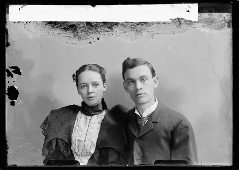 Young couple taking their photo thogether over 120 years ago, Glass negative circa 1890s.