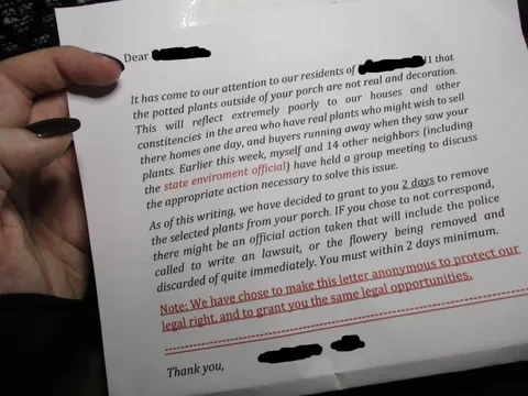 This poorly written letter from my passive aggressive neighbor telling me to remove my 'legally-owned' plants from my property