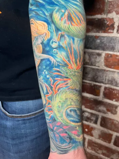 What I asked for vs what I got. Done by Tallartist at Fountain Square Tattoo, IN.