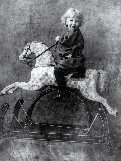 My grandpa riding a rocking horse ca. 1912, me riding the same horse in 1974, and a current photo of the rocking horse as it looks today.