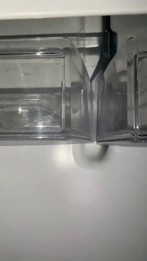 The student was looking for a drink in the fridge