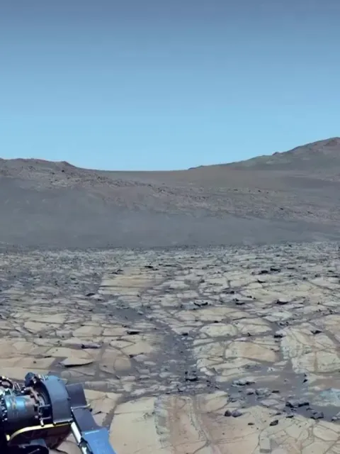 NASA CAPTURES RARE BLUE SKIES OVER MARS.