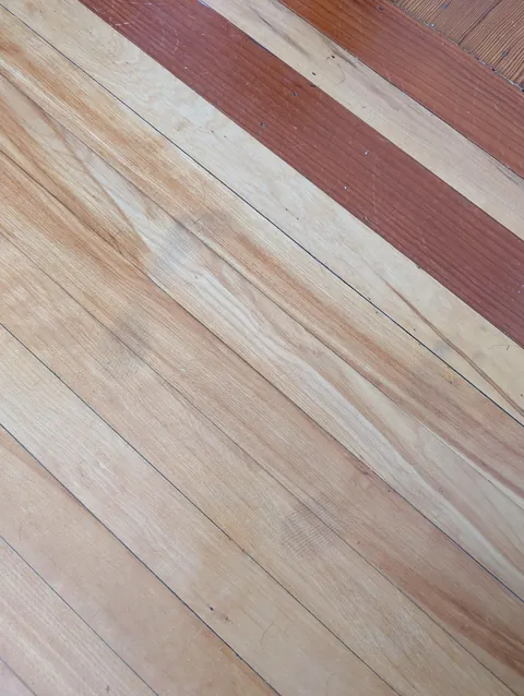 Just moved into a house from 1890 and it has this single set of child footprints marked on the floor that won't wipe away