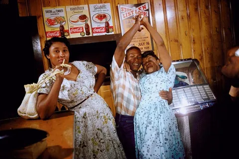 People enjoying a good time in a small "Juke" party, South Carolina, 1956. Kodachrome shot. I think this is a small diner establishment.