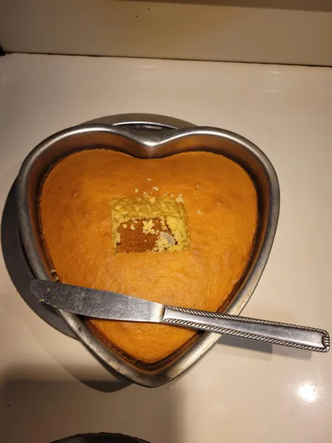 Baked a cake for my parent's anniversary and my brother did this