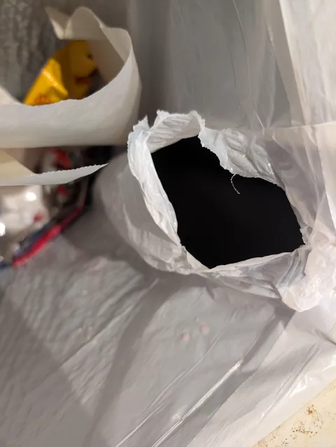 My roommate rips holes in garbage bags to "let the air out" when he puts a new one in the can