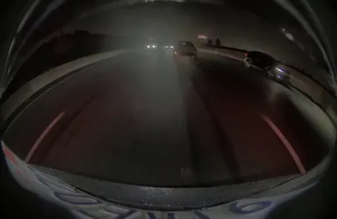 [OC] Idiot driving in the dark without headlights. I didn't even see it after I made my lane change.