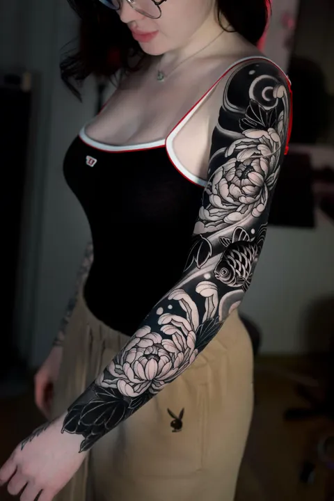 Sleeve with flowers and fish made by Dima Taylor from Krakow, Poland . Studio Dima Taylor