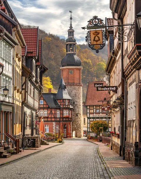 13th-century Saigerturm(Saiger Tower) with a 19th-century upper replacement seen from a cobblestone street in the town of Stolberg, Saxony-Anhalt, Germany.