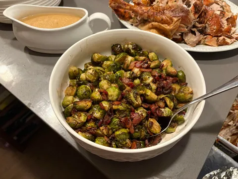 Nervous to share, but cooked [homemade] Friendsgiving spread for my pals - turkey, gravy, taters, sprouts, gb casserole, Mac, rolls, carrots
