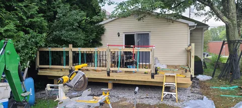 Replaced the deck that was falling apart when I bought the house, and decided to go bigger