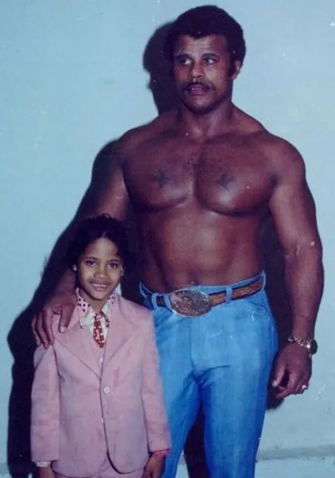 Dwayne "The Rock" Johnson and his father, 1980s