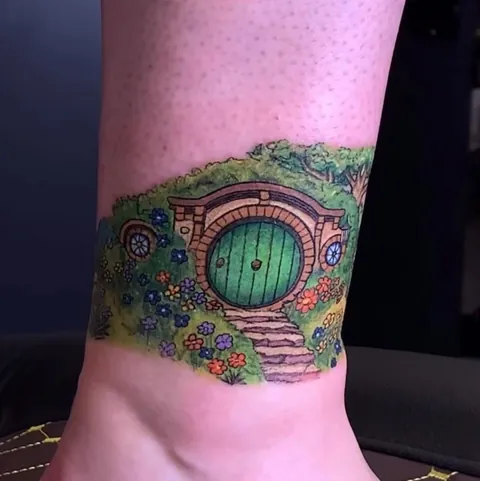 Thought I’d put a towel on my ottoman so that I could rest my new tattoo without getting cat hair on it