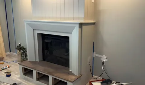 I built a fireplace, cabinets and floating shelves
