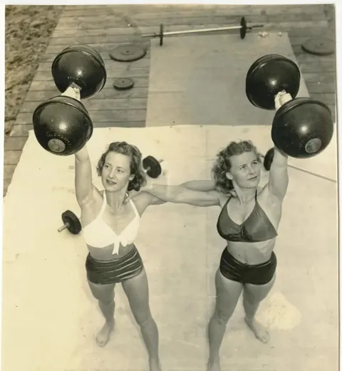 Photos of Stunt woman and athlete Relna Brewer Mcrea during her prime in Santa Monica, California, 1946. 5ft 2in and 110 pounds, could hold over 120 on one hand