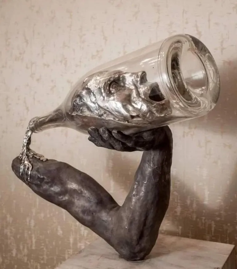 "First the man takes the drink, then the drink takes the man." Reality   Amazing Sculpture