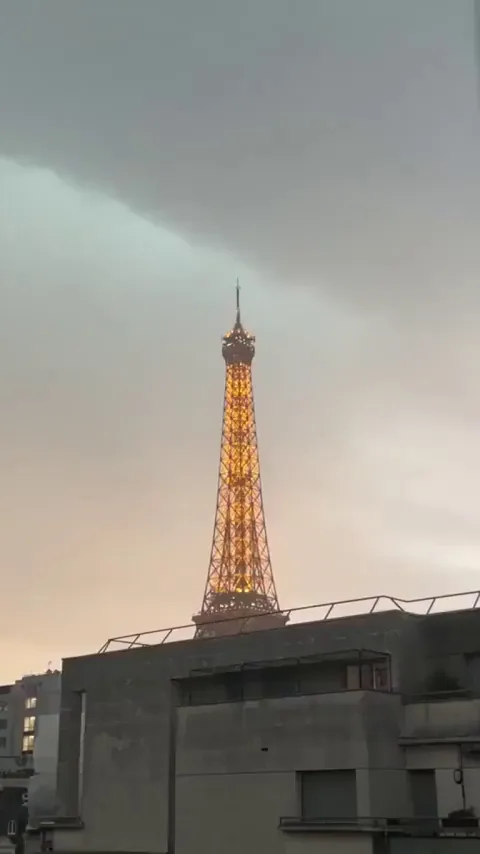 Torriental Downpour Makes This Effiel Tower Disappear