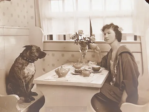 My 2nd great-grandma Judy and her adoring breakfast companion, c. 1910.
