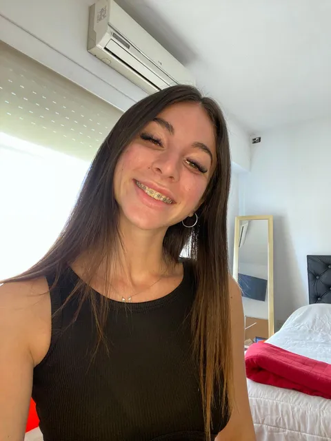 I enjoy teasing you with my braces.