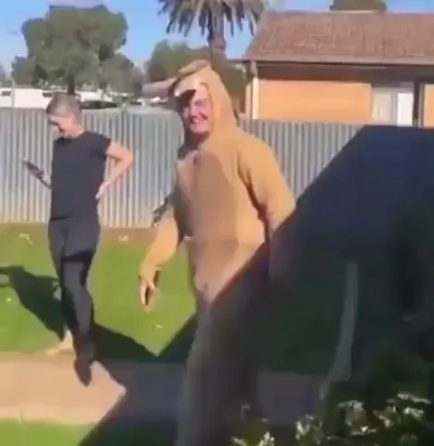 Baby Kangaroo entered their garden and was refusing to leave. So this guy dressed up as mama kangaroo and tried to put it in his Kangaroo pouch