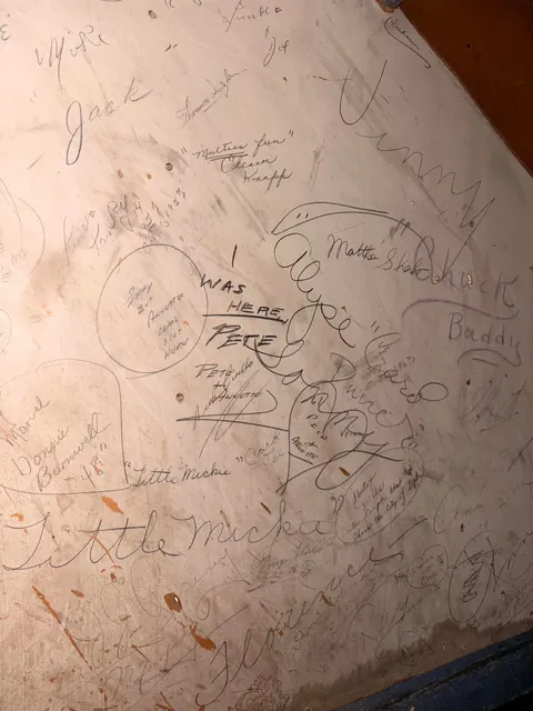 Signatures of party-goers from the 40s and 50s in my century y/o basement