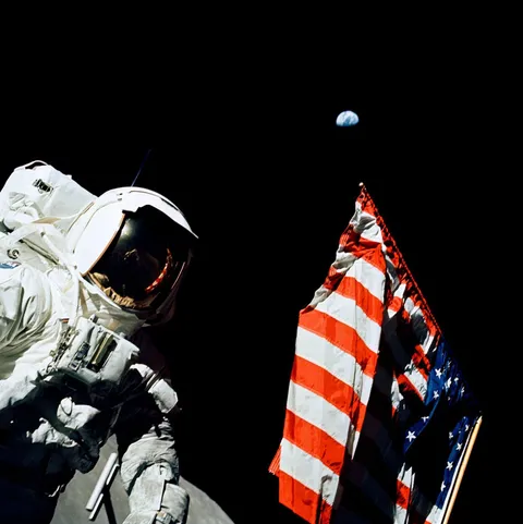 52 years ago this week during the Apollo 17 mission, Harrison H. Schmitt took a break from moon walking to pose with the American flag and Earth.