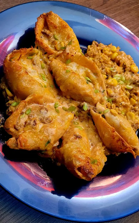 [Homemade] Taco shells on top of street corn and rice