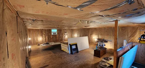 Finished the 2nd floor of my garage into a Home Theatre and Gym.