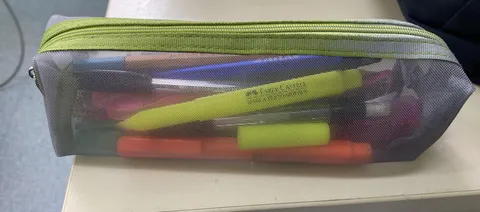 I accidentally left my marker open and now my pencil case is green