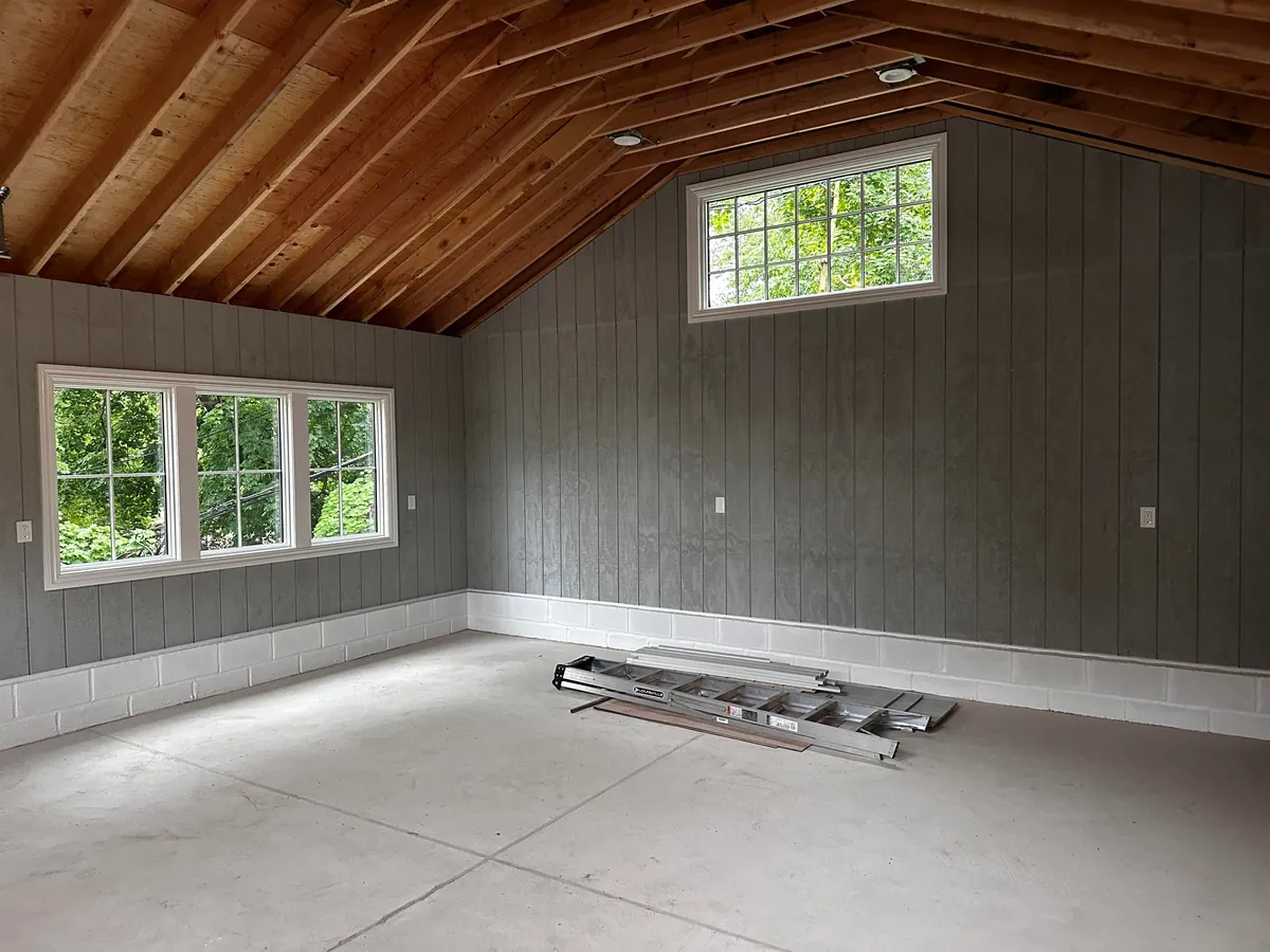 Before and after neighbor’s tree fell on our garage.