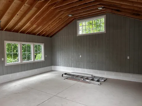 Before and after neighbor’s tree fell on our garage.