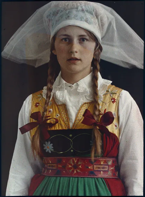 Autochrome shot of a swedish young  lady in her traditional clothes, 1912.