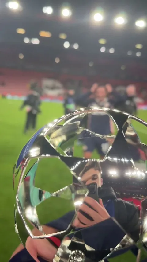 Driouech receiving his MOTM award after Liverpool v PSV