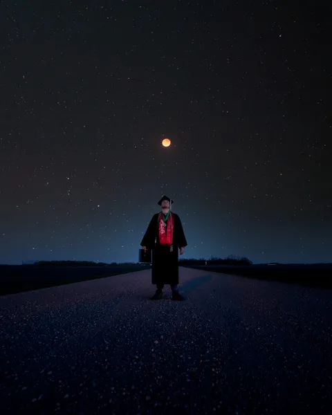 I graduated with a B.S. in Physics the same day as the total lunar eclipse - here's my grad photo