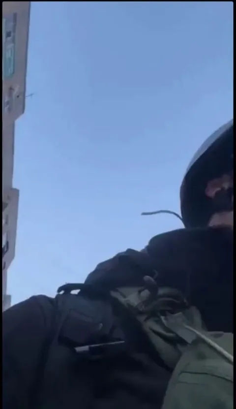 Russian missile flies over a journalist