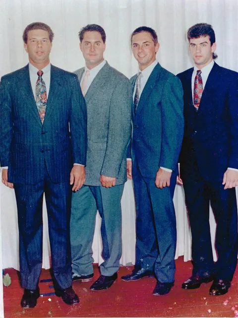 my dad with his friends on a cruise. 1980s