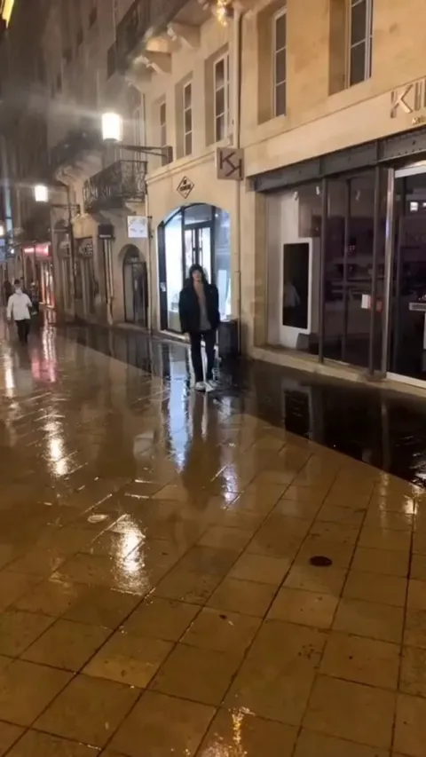 Sliding across the wet ground