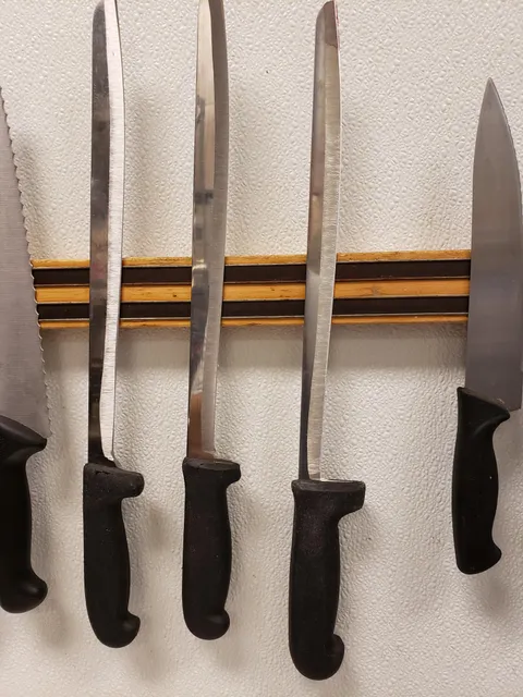 These knives at my work have been used so much they're almost gone.