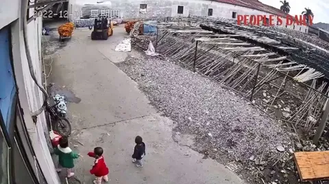 Big sister stops forklift to make sure younger siblings are out of the way
