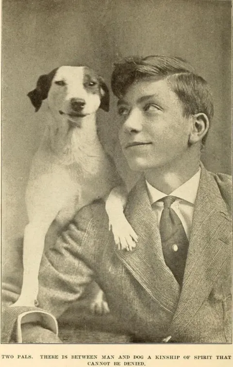 man with pet dog 1920s