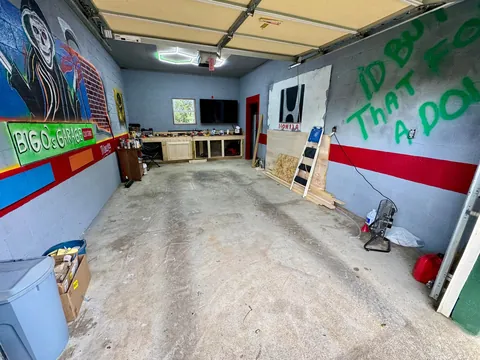 Here’s an image dump of my garage over the past year. My dad painted everything on the walls. He had a blast! Hope y’all like it.
