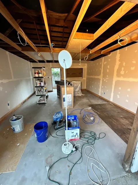 Turned my 1903 three car garage into 1/2 garage and 1/2 bedroom and bathroom my