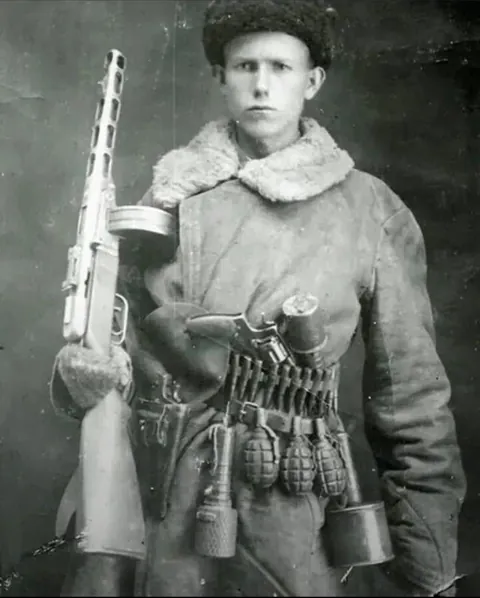 A Soviet partisan (1943).