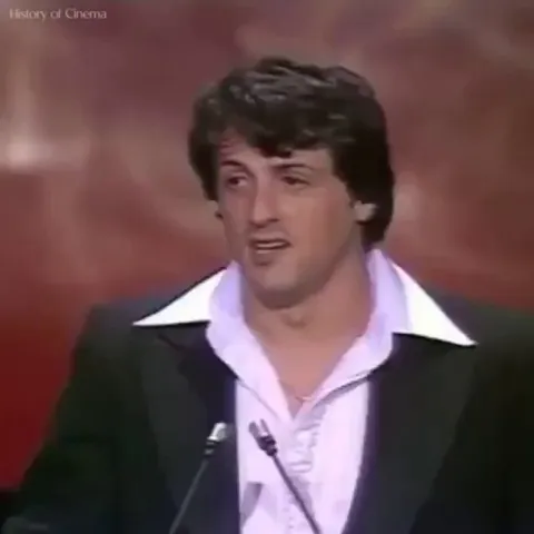 Mohammed Ali sneaks up on Sly. 1977