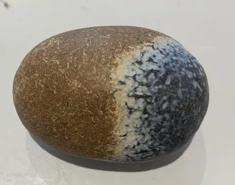 I found a rock on a beach that looks like a beach on a rock