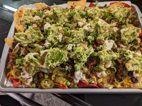 [Homemade] FULLY loaded nachos after getting fully loaded myself.  