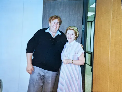 My grandmother and 'Big John' Candy. She was a secretary for the accounting firm that handled his finances. August 1988.