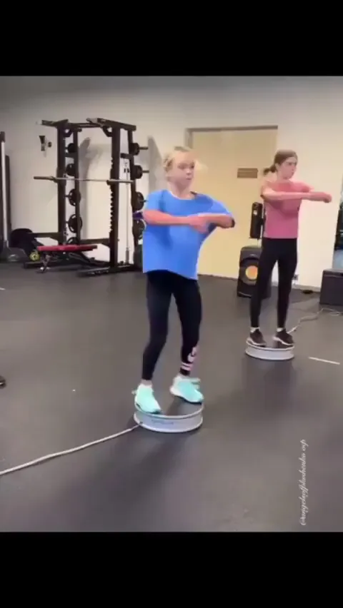 This girl has unbelievable balance on spin cycle and repeat