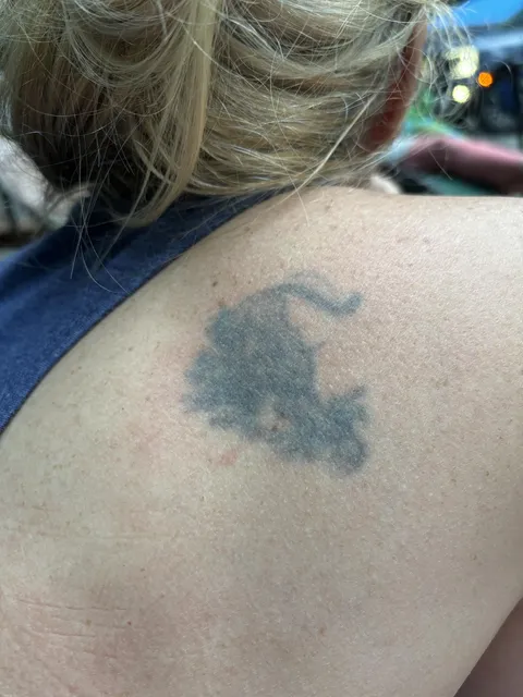 Advice needed: My mom had a sick ass panther done in the 80s and now she needs a cover up